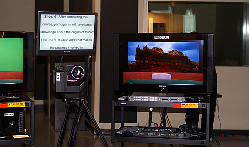 Cameras, teleprompters, and monitors are only a part of the technical equipment in the studio.  Photo Credit:  NIPTC.